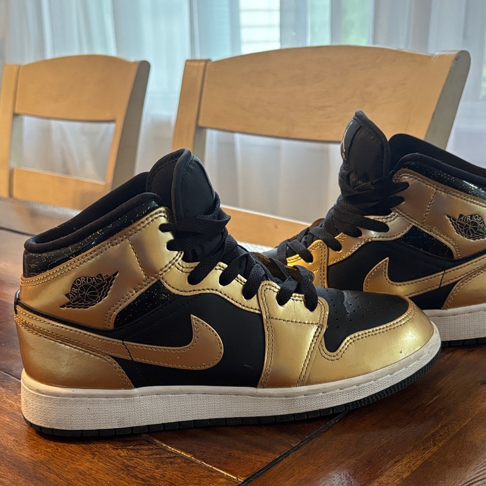 Nike Air Jordan Black and Gold High-Top Sneakers size 6.5Y (women’s 8)